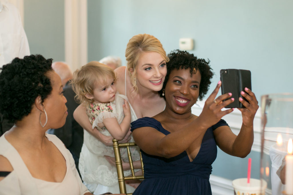 bride and maid of honor take a selfie