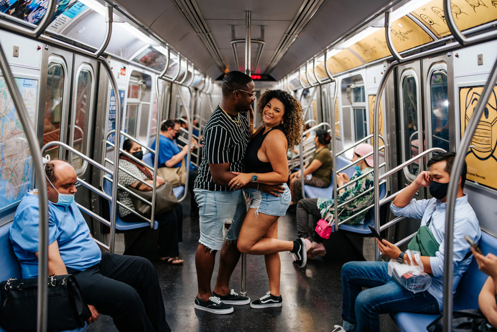 New York City couple in the subway during photoshoot