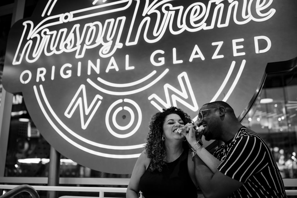 New York City couple eats Krispy Kream donuts during photoshoot